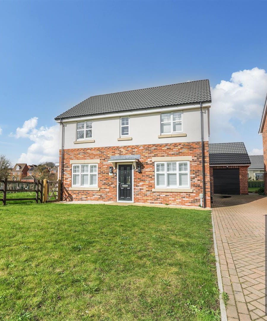 Detached home photographed by Ashford & Moult